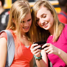girls using phone